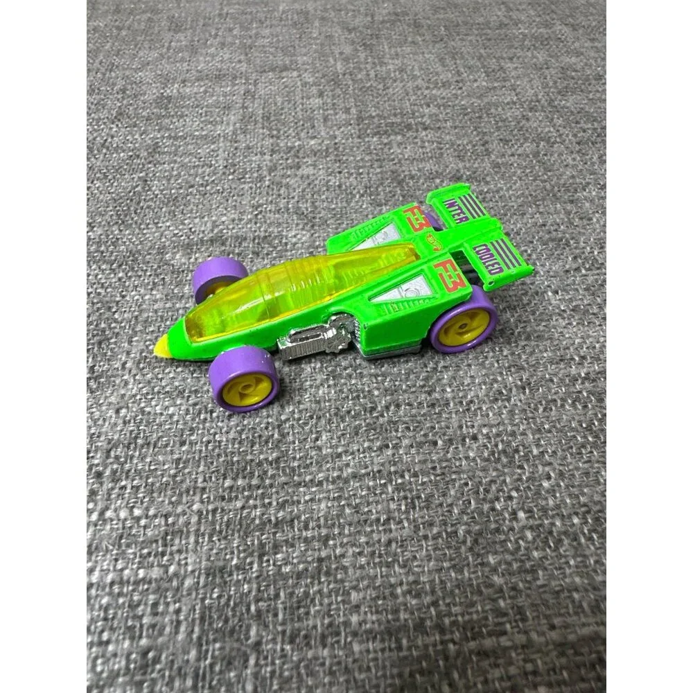 Hot Wheels 1997 Inter-Cooled Green Die-Cast Car With Purple Wheels